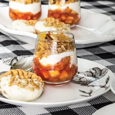 layered dessert in stemless wine glass